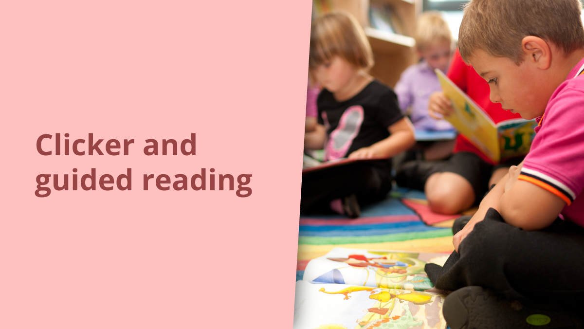 Clicker and guided reading - a group of children sitting on the carpet reading story books.